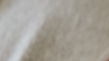 Black couple, love and bedroom romance while happy and intimate on a bed at home, apartment or hotel to relax. Face of a young man and woman in a happy marriage with commitment, trust and care