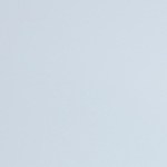 A couple sharing a delightful lunch at a beachside restaurant, enjoying quality time and sunshine by the ocean. Perfect scene of romance and relaxation.